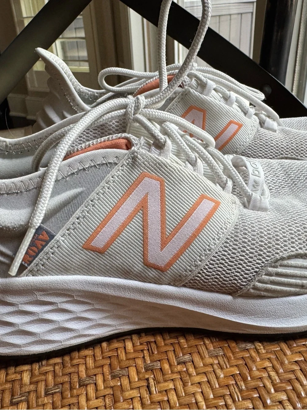New Balance Women’s White Sneakers with Coral Accents